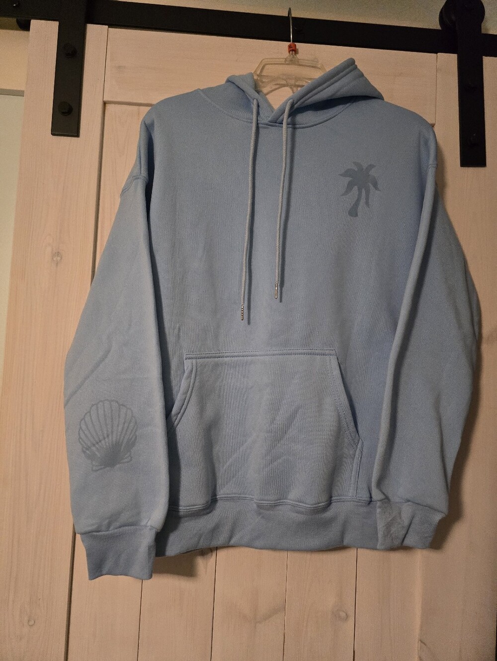 Light Blue Hooded Sweatshirt with Palm & Shell Motif